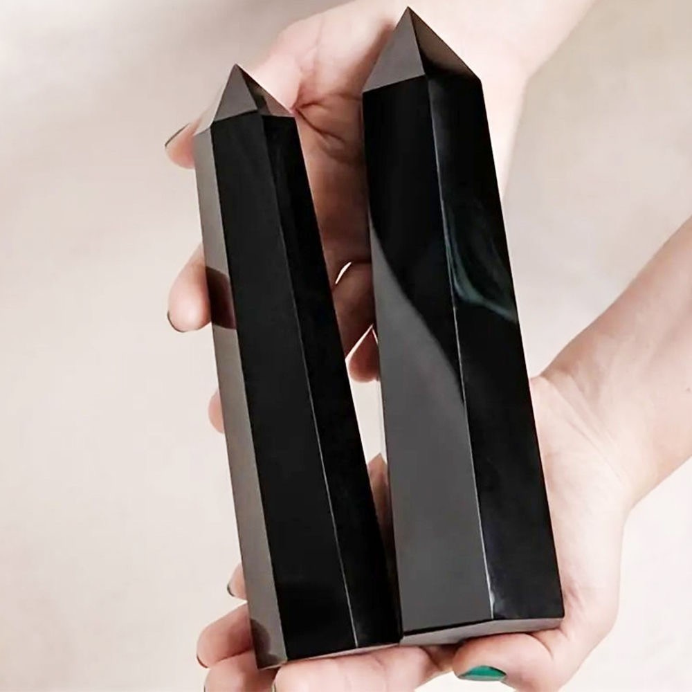 Obsidian prism shaped pillar receives energy and is handmade from raw stone
