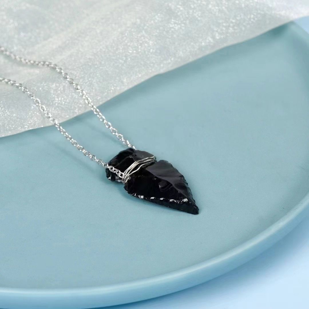 Handcrafted obsidian Indian arrowhead rough stone