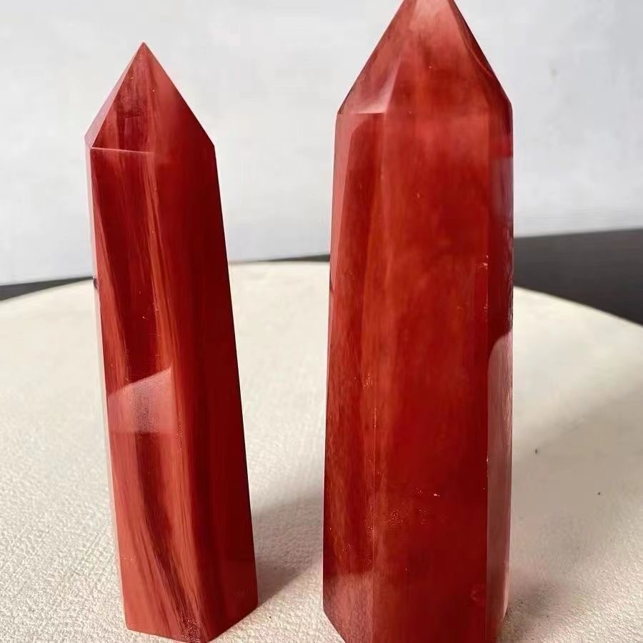Red crystal raw stone hexagonal polished lucky ornament sent to the base
