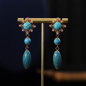 Trendy women's palace style hollow turquoise long pendant earrings