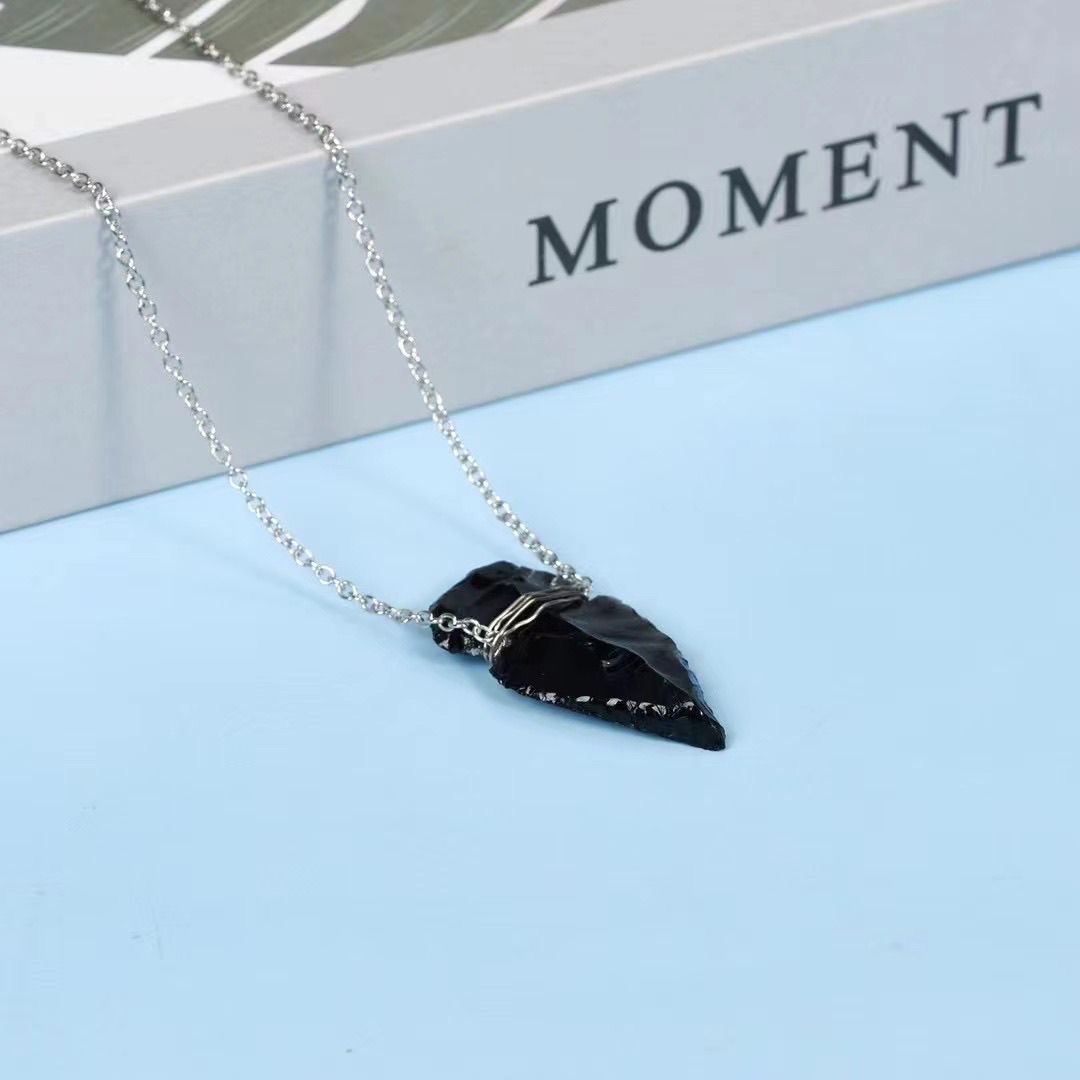Handcrafted obsidian Indian arrowhead rough stone