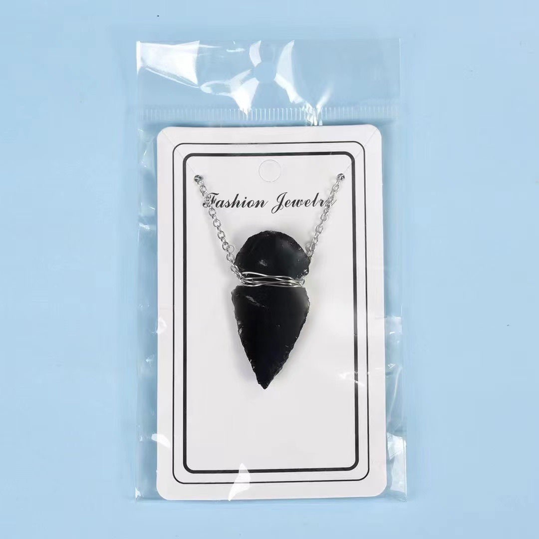 Handcrafted obsidian Indian arrowhead rough stone
