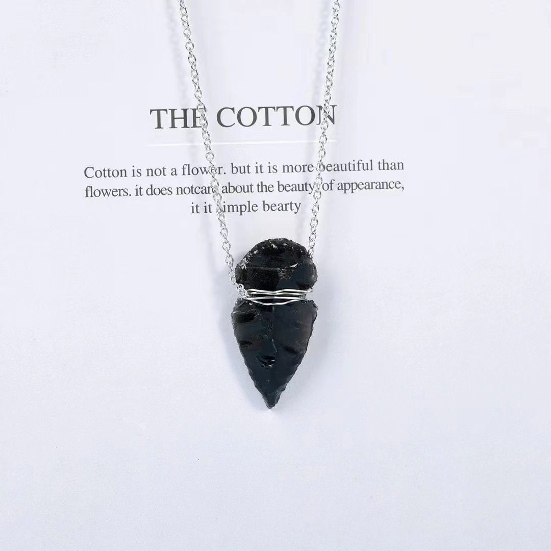 Handcrafted obsidian Indian arrowhead rough stone