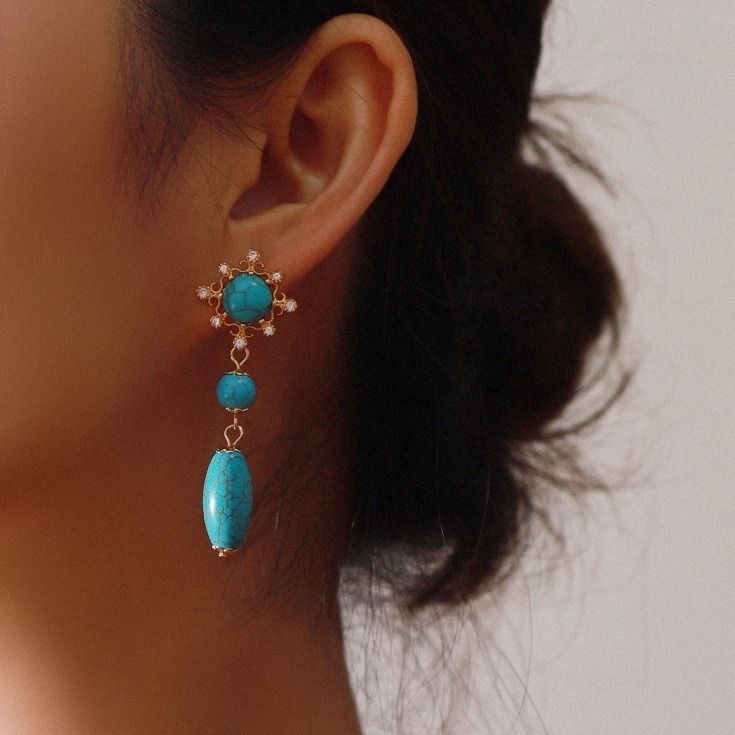 Trendy women's palace style hollow turquoise long pendant earrings